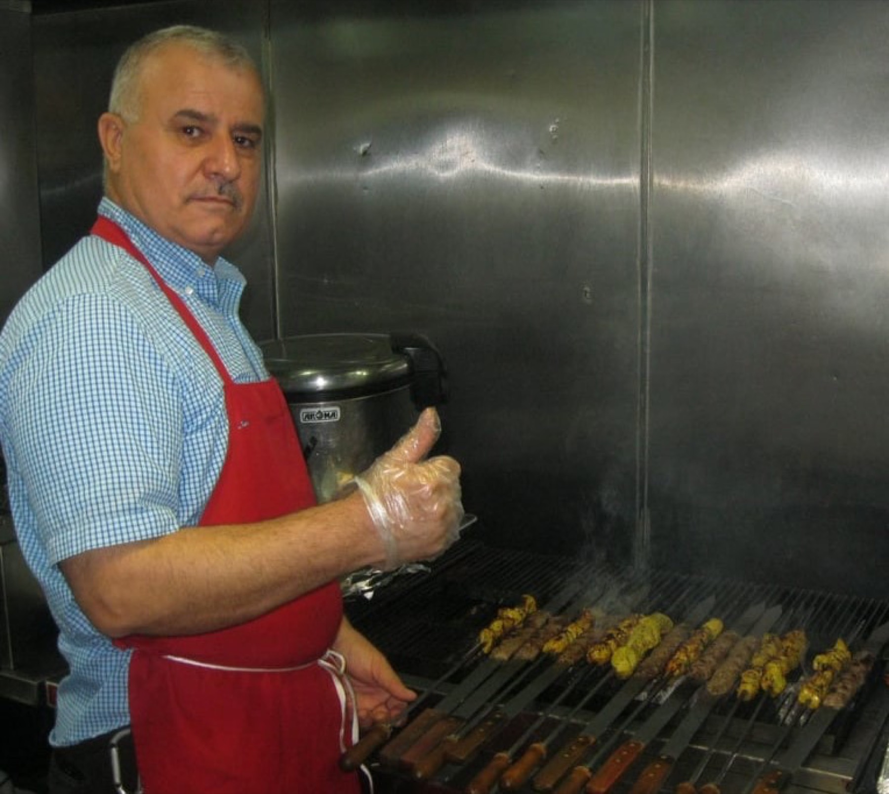 Xenia founder cooking at the grill
